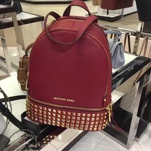 Michal Kors Leather backpack with studds